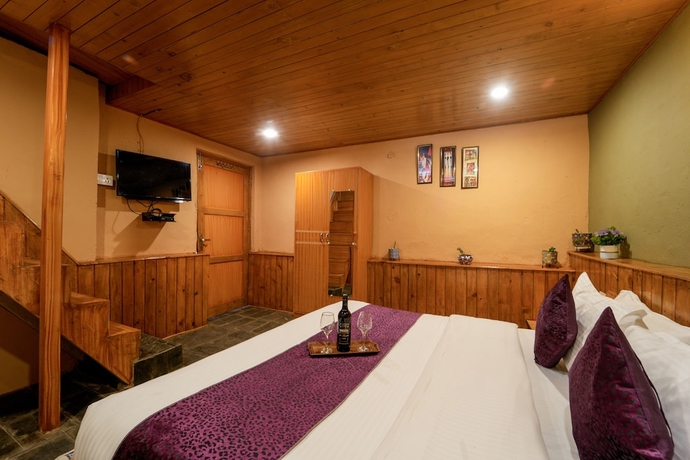 Imagen de la habitación del Hotel Dharamshala Village Resort. Foto 13