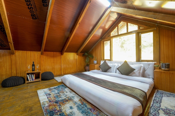 Imagen de la habitación del Hotel Dharamshala Village Resort. Foto 15