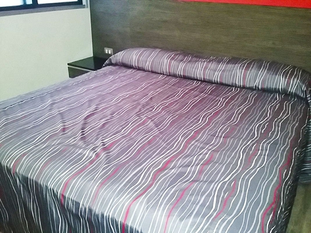 Imagen de la habitación del Hotel Dharma. Foto 6