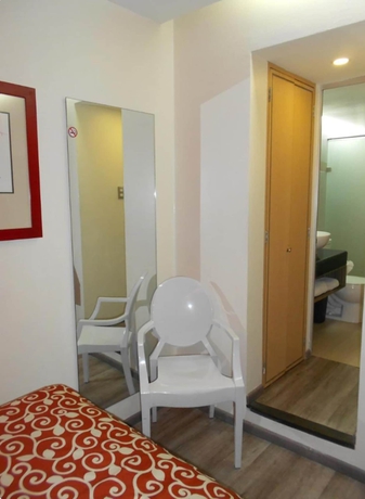 Imagen de la habitación del Hotel Dharma. Foto 11