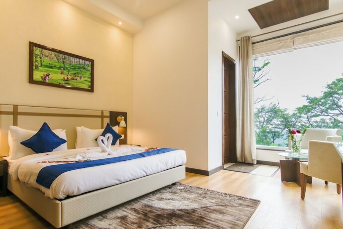 Imagen de la habitación del Hotel Dhauladhar Heights Resort. Foto 17