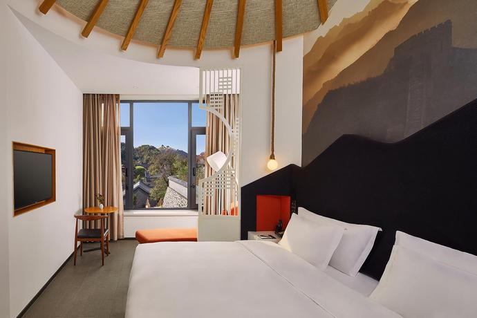 Imagen de la habitación del Hotel Dhawa Jinshanling. Foto 2