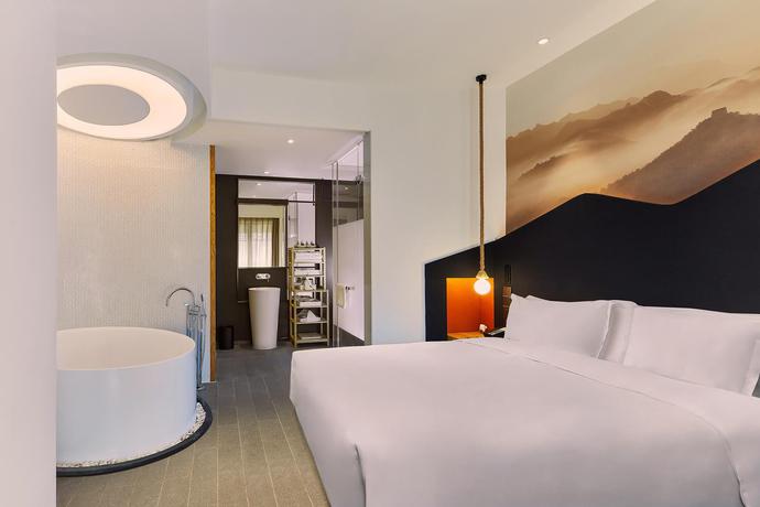 Imagen de la habitación del Hotel Dhawa Jinshanling. Foto 3