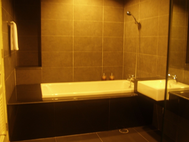 Imagen de la habitación del Hotel Dheva Residences Suites. Foto 3