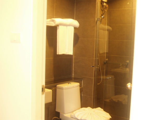 Imagen de la habitación del Hotel Dheva Residences Suites. Foto 4