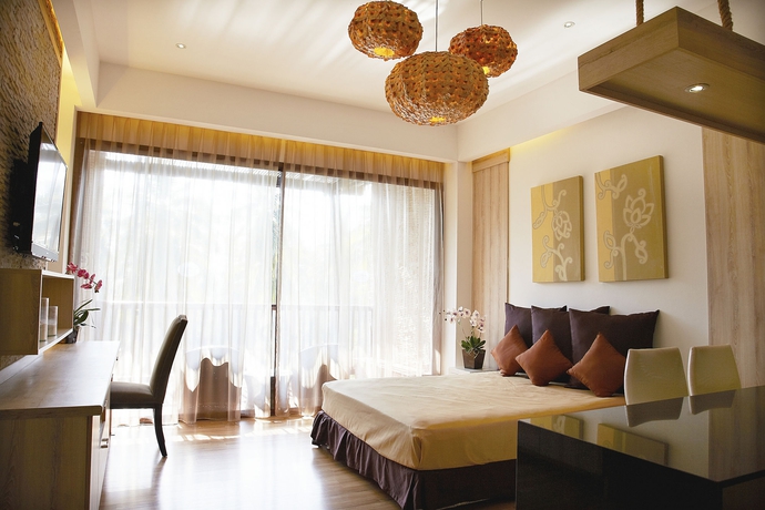 Imagen de la habitación del Hotel Dhevan Dara Beach Villa. Foto 9