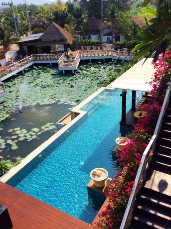 Imagen de la piscina del Hotel Dhevan Dara Resort and Spa. Foto 16