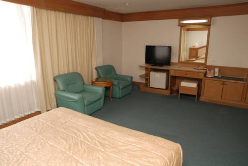 Imagen de la habitación del Hotel Dhevaraj. Foto 2