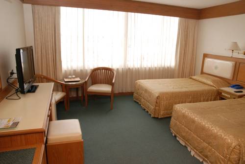 Imagen de la habitación del Hotel Dhevaraj. Foto 5