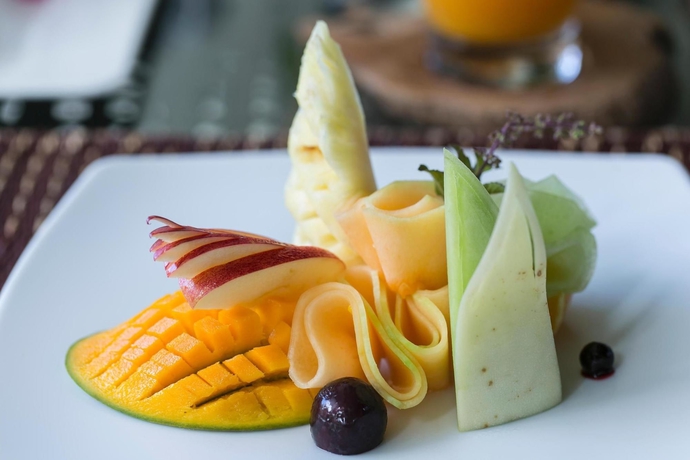 Imagen del bar/restaurante del Hotel Dhevatara Beach. Foto 5