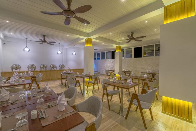 Imagen del bar/restaurante del Hotel Dhiguveli Maldives. Foto 3