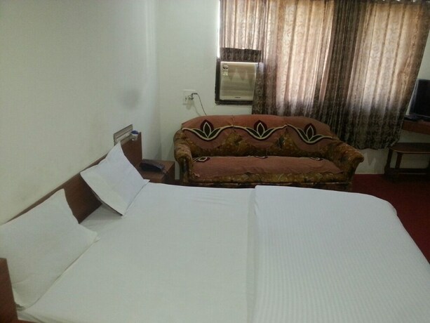 Imagen de la habitación del Hotel Dhruv Palace. Foto 20