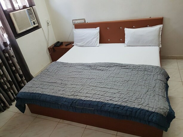 Imagen de la habitación del Hotel Dhruv Palace. Foto 23