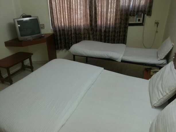 Imagen de la habitación del Hotel Dhruv Palace. Foto 31