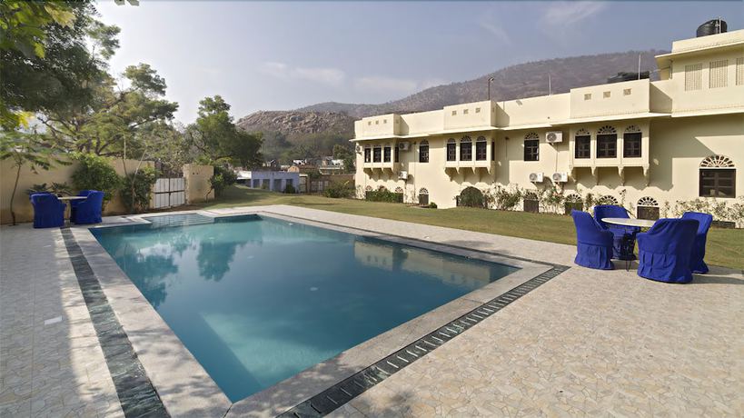 Imagen de la piscina del Hotel Dhula Garh A Heritage. Foto 17