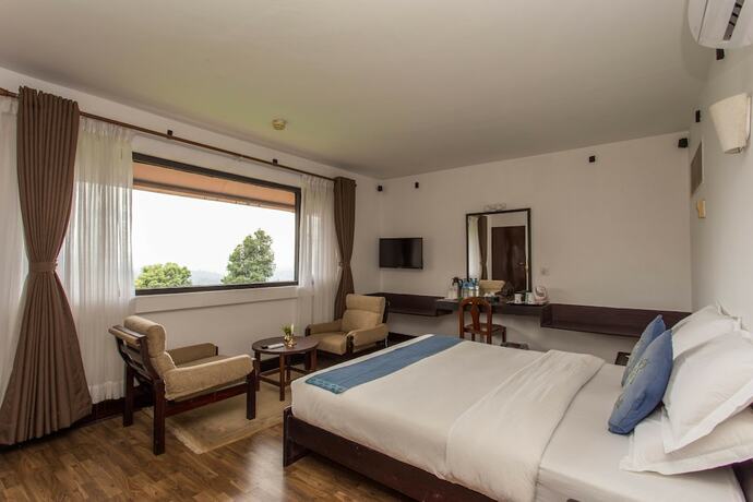 Imagen de la habitación del Hotel Dhulikhel Mountain Resort. Foto 19