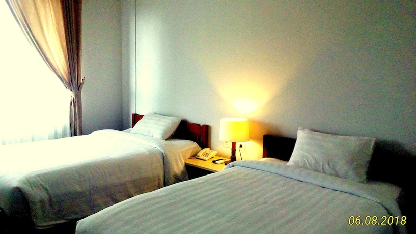 Imagen de la habitación del Hotel Dhyanapura City. Foto 21