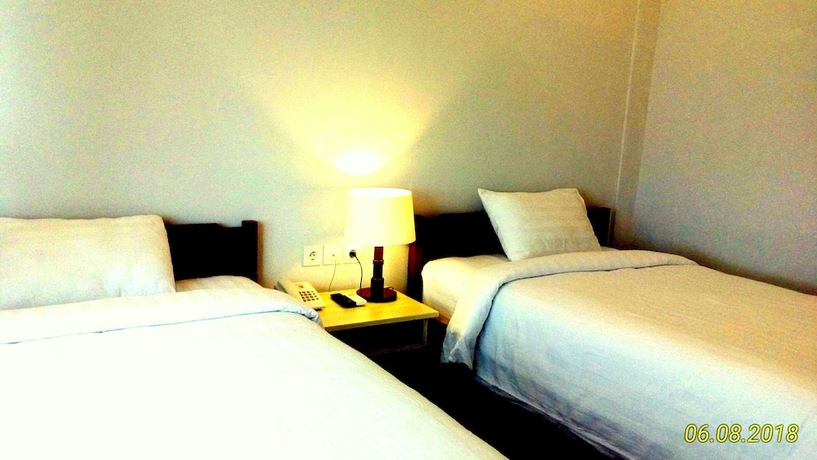 Imagen de la habitación del Hotel Dhyanapura City. Foto 28