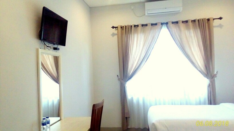 Imagen de la habitación del Hotel Dhyanapura City. Foto 29