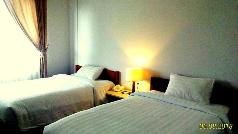 Imagen de la habitación del Hotel Dhyanapura City. Foto 30