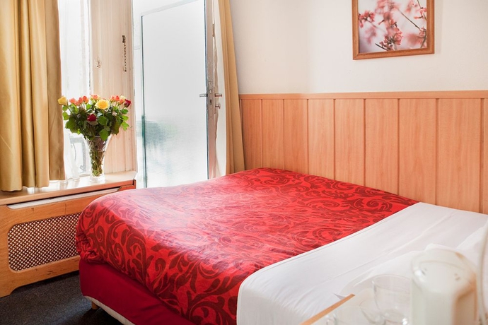 Imagen de la habitación del Hotel Di Ann Amsterdam City Centre. Foto 4