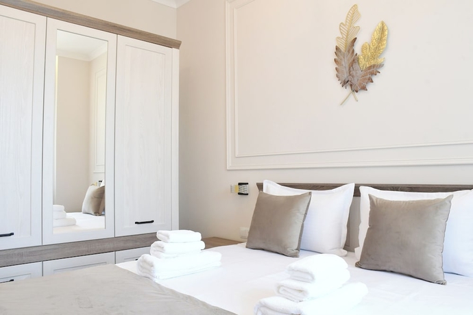 Imagen de la habitación del Hotel DiAngelo Guesthouse. Foto 5