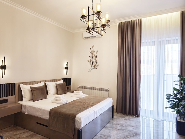Imagen de la habitación del Hotel DiAngelo Guesthouse. Foto 6