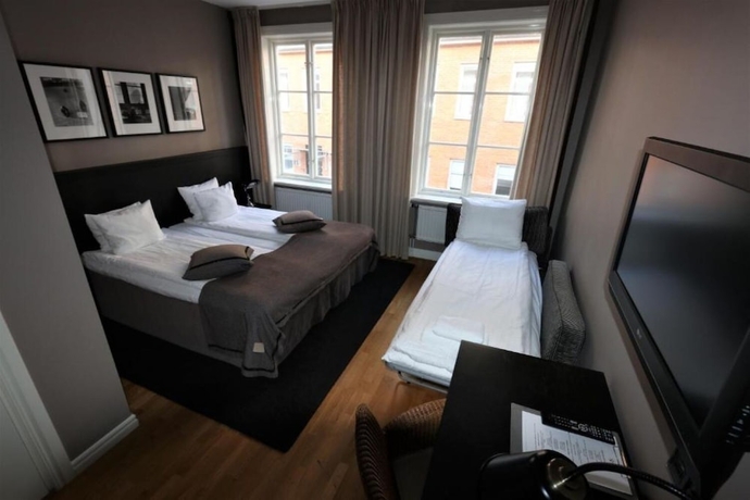 Imagen de la habitación del Hotel Dialog Villan. Foto 2