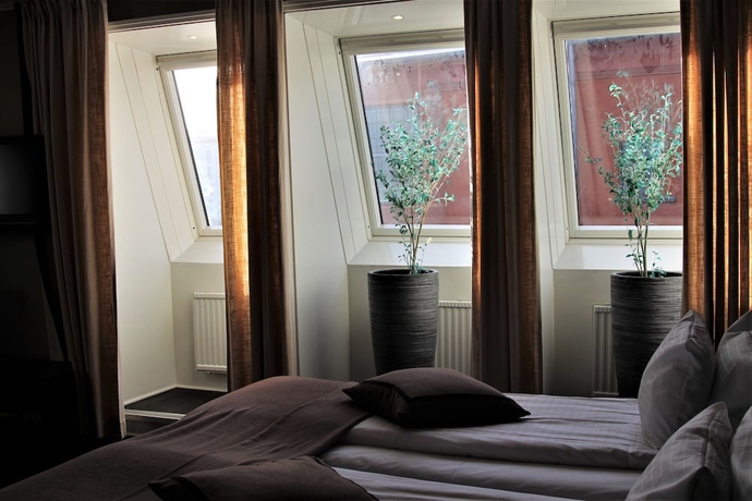 Imagen de la habitación del Hotel Dialog Villan. Foto 7