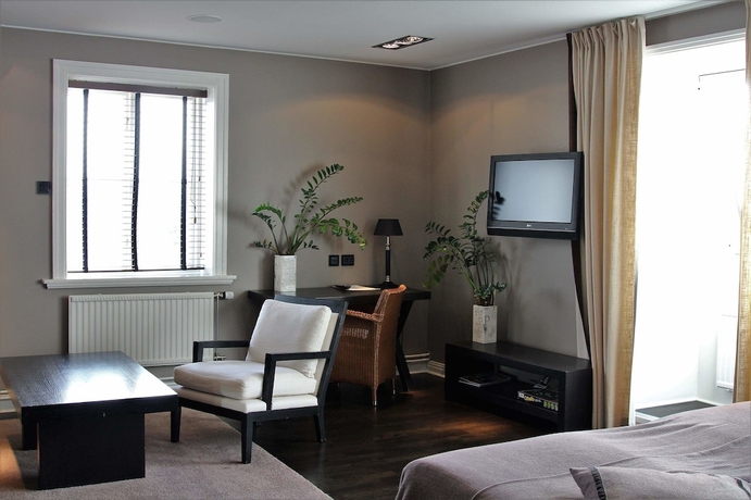 Imagen de la habitación del Hotel Dialog Villan. Foto 16