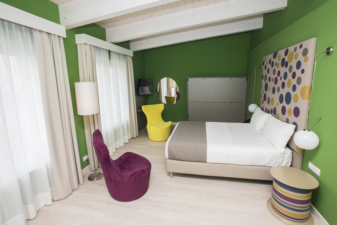 Imagen de la habitación del Hotel Diamante Mhotel. Foto 5