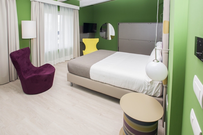 Imagen de la habitación del Hotel Diamante Mhotel. Foto 6