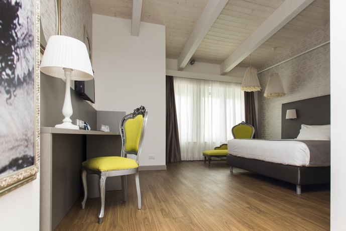 Imagen de la habitación del Hotel Diamante Mhotel. Foto 11