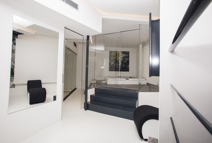 Imagen de la habitación del Hotel Diamante Mhotel. Foto 16