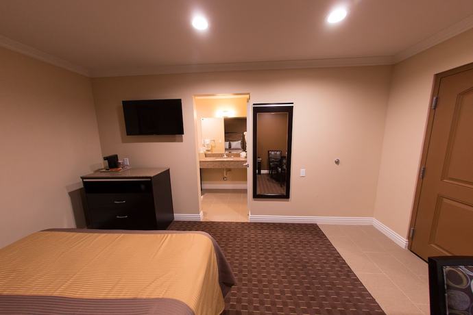 Imagen de la habitación del Hotel Diamond Bell Inn and Suites. Foto 7