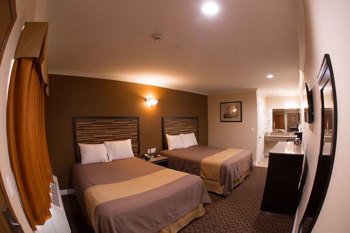 Imagen de la habitación del Hotel Diamond Bell Inn and Suites. Foto 11