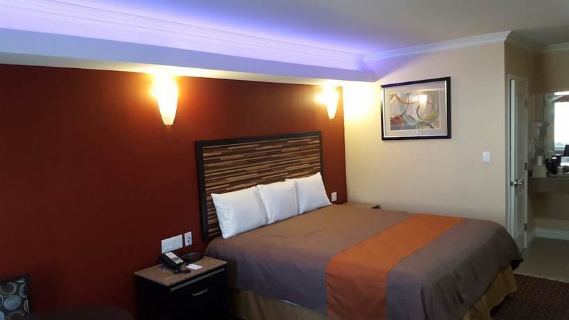 Imagen de la habitación del Hotel Diamond Bell Inn and Suites. Foto 12