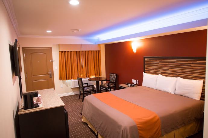 Imagen de la habitación del Hotel Diamond Bell Inn and Suites. Foto 16