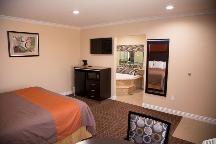 Imagen de la habitación del Hotel Diamond Bell Inn and Suites. Foto 18