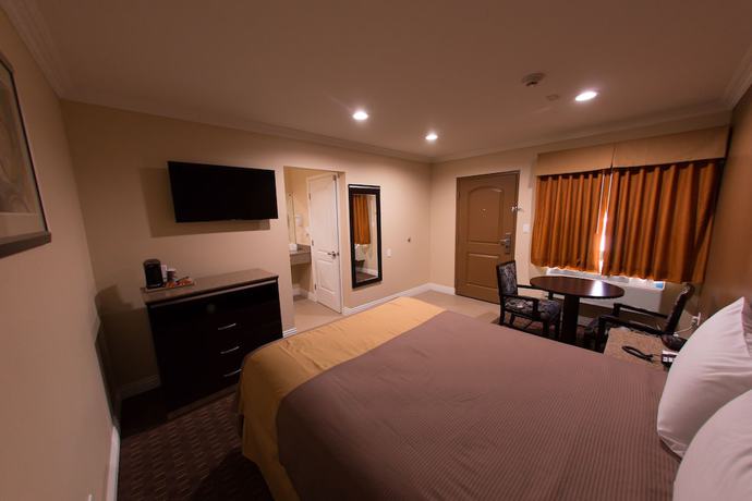 Imagen de la habitación del Hotel Diamond Bell Inn and Suites. Foto 19