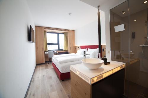Imagen de la habitación del Hotel Diamond City Tulln. Foto 8