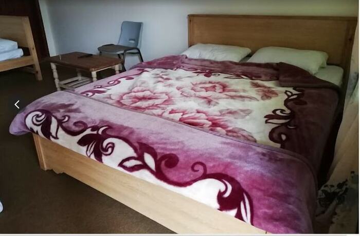 Imagen de la habitación del Hotel Diamond Deluxe Karimabad Hunza. Foto 6