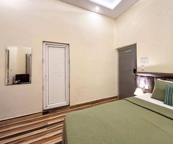 Imagen de la habitación del Hotel Diamond Palace, Varanasi. Foto 5