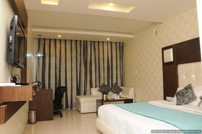 Imagen de la habitación del Hotel Diamond Plaza, Chandigarh. Foto 23