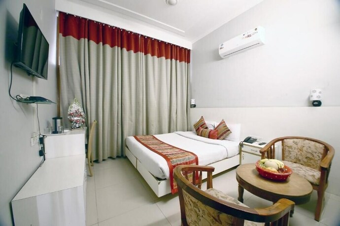 Imagen de la habitación del Hotel Diamond Plaza, Chandigarh. Foto 24