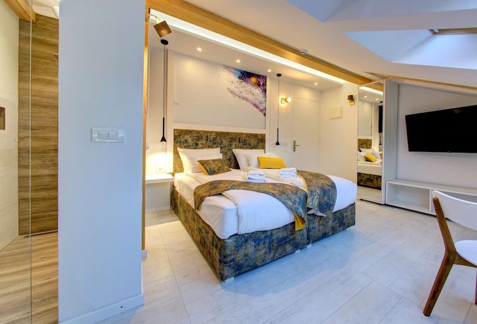Imagen de la habitación del Hotel Diamond Rain Boutique. Foto 11