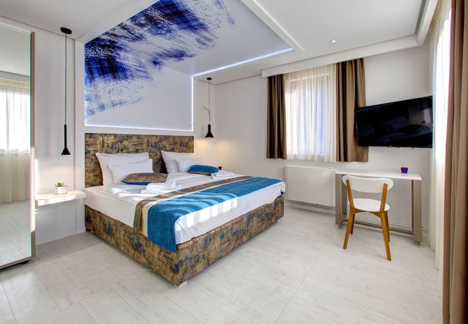 Imagen de la habitación del Hotel Diamond Rain Boutique. Foto 13