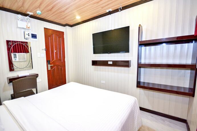 Imagen de la habitación del Hotel Diamond Water Edge Resort. Foto 15