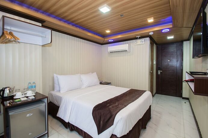 Imagen de la habitación del Hotel Diamond Water Edge Resort. Foto 17