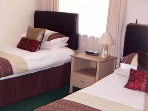 Imagen de la habitación del Hotel Diamonds Lodge Ltd. Foto 13